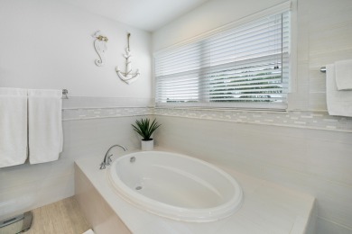 This Key Colony Beach coastal retreat blends modern elegance on Key Colony Beach Golf Course in Florida - for sale on GolfHomes.com, golf home, golf lot
