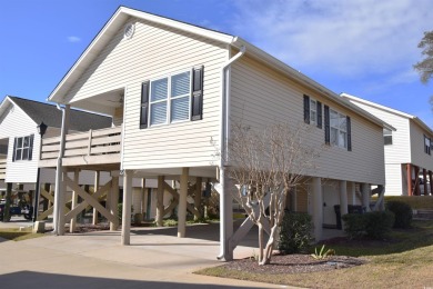 Your Slice of Paradise Awaits at 9620 Windchime Dr.!  Imagine on The Dunes Golf and Beach Club in South Carolina - for sale on GolfHomes.com, golf home, golf lot