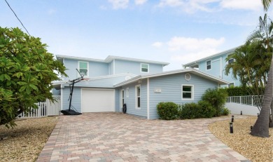 This Key Colony Beach coastal retreat blends modern elegance on Key Colony Beach Golf Course in Florida - for sale on GolfHomes.com, golf home, golf lot