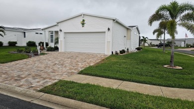 Enjoy the Florida Lifestyle in the resort-style 55+ active gated on The Riverside Golf Club in Florida - for sale on GolfHomes.com, golf home, golf lot