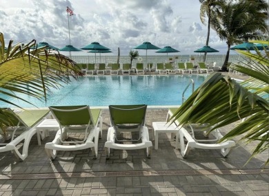 This Key Colony Beach coastal retreat blends modern elegance on Key Colony Beach Golf Course in Florida - for sale on GolfHomes.com, golf home, golf lot