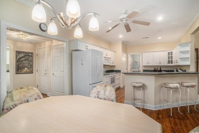 Elegance meets timeless Southern charm in this exquisite on Pawleys Plantation Golf and Country Club in South Carolina - for sale on GolfHomes.com, golf home, golf lot