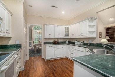 Elegance meets timeless Southern charm in this exquisite on Pawleys Plantation Golf and Country Club in South Carolina - for sale on GolfHomes.com, golf home, golf lot