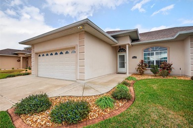 A Lot of Bang for the buck in Gated, Stonecrest a 55+ community on Stonecrest Golf and Club Club in Florida - for sale on GolfHomes.com, golf home, golf lot