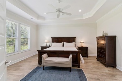 Situated on over an acre in the prestigious Sanctuary Cove on The Golf Club At Sanctuary Cove in Georgia - for sale on GolfHomes.com, golf home, golf lot