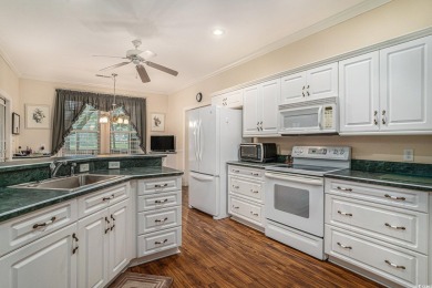 Elegance meets timeless Southern charm in this exquisite on Pawleys Plantation Golf and Country Club in South Carolina - for sale on GolfHomes.com, golf home, golf lot