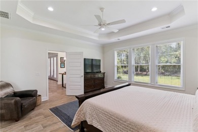 Situated on over an acre in the prestigious Sanctuary Cove on The Golf Club At Sanctuary Cove in Georgia - for sale on GolfHomes.com, golf home, golf lot