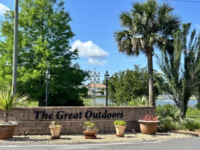 Welcome home! This quaint, custom built executive suite is on The Great Outdoors Golf and Country Club in Florida - for sale on GolfHomes.com, golf home, golf lot