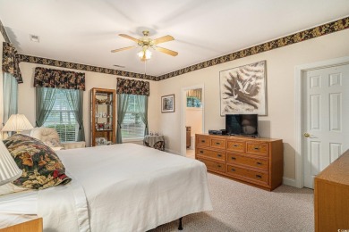 Elegance meets timeless Southern charm in this exquisite on Pawleys Plantation Golf and Country Club in South Carolina - for sale on GolfHomes.com, golf home, golf lot