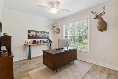 Situated on over an acre in the prestigious Sanctuary Cove on The Golf Club At Sanctuary Cove in Georgia - for sale on GolfHomes.com, golf home, golf lot