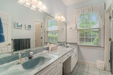 Elegance meets timeless Southern charm in this exquisite on Pawleys Plantation Golf and Country Club in South Carolina - for sale on GolfHomes.com, golf home, golf lot