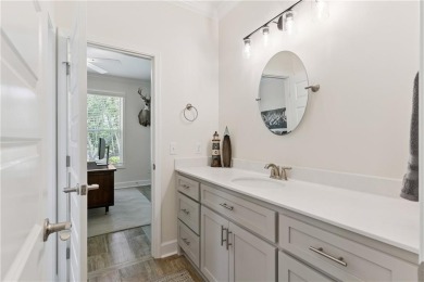 Situated on over an acre in the prestigious Sanctuary Cove on The Golf Club At Sanctuary Cove in Georgia - for sale on GolfHomes.com, golf home, golf lot