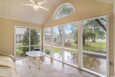 Elegance meets timeless Southern charm in this exquisite on Pawleys Plantation Golf and Country Club in South Carolina - for sale on GolfHomes.com, golf home, golf lot