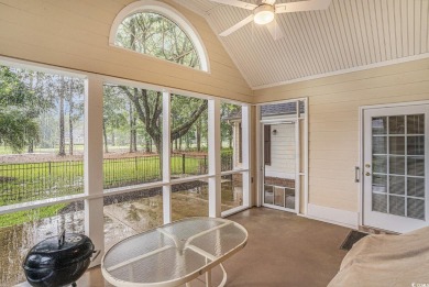 Elegance meets timeless Southern charm in this exquisite on Pawleys Plantation Golf and Country Club in South Carolina - for sale on GolfHomes.com, golf home, golf lot