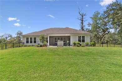 Situated on over an acre in the prestigious Sanctuary Cove on The Golf Club At Sanctuary Cove in Georgia - for sale on GolfHomes.com, golf home, golf lot