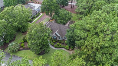 Elegance meets timeless Southern charm in this exquisite on Pawleys Plantation Golf and Country Club in South Carolina - for sale on GolfHomes.com, golf home, golf lot