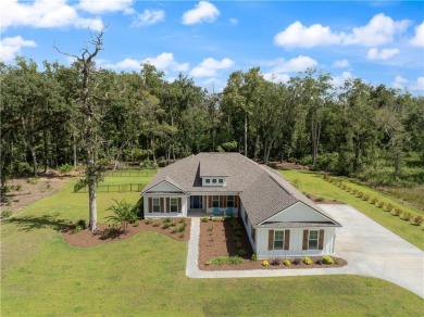 Situated on over an acre in the prestigious Sanctuary Cove on The Golf Club At Sanctuary Cove in Georgia - for sale on GolfHomes.com, golf home, golf lot