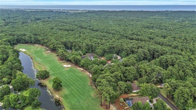 Elegance meets timeless Southern charm in this exquisite on Pawleys Plantation Golf and Country Club in South Carolina - for sale on GolfHomes.com, golf home, golf lot