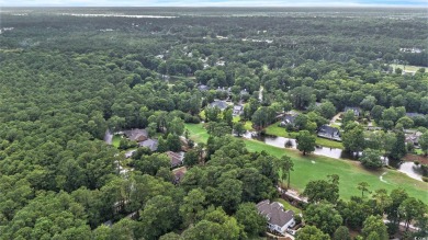 Elegance meets timeless Southern charm in this exquisite on Pawleys Plantation Golf and Country Club in South Carolina - for sale on GolfHomes.com, golf home, golf lot