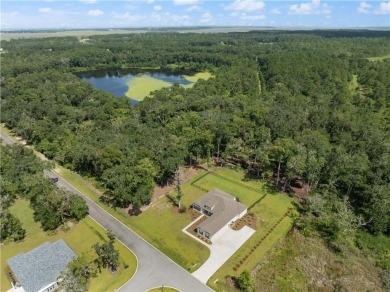 Situated on over an acre in the prestigious Sanctuary Cove on The Golf Club At Sanctuary Cove in Georgia - for sale on GolfHomes.com, golf home, golf lot