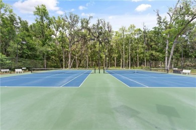 Situated on over an acre in the prestigious Sanctuary Cove on The Golf Club At Sanctuary Cove in Georgia - for sale on GolfHomes.com, golf home, golf lot