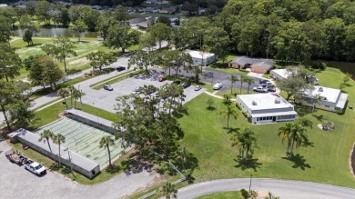 One or more photo(s) has been virtually staged. Move-in ready on Summertree Golf Course in Florida - for sale on GolfHomes.com, golf home, golf lot