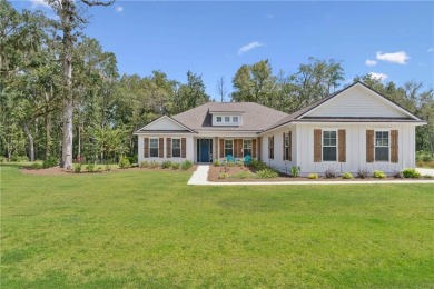 Situated on over an acre in the prestigious Sanctuary Cove on The Golf Club At Sanctuary Cove in Georgia - for sale on GolfHomes.com, golf home, golf lot