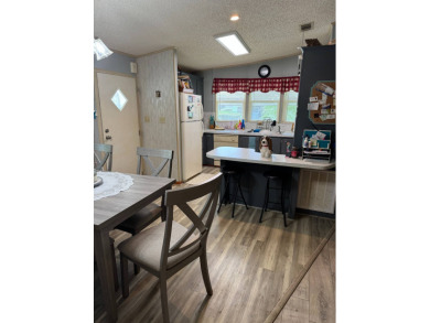 This well-maintained 2-bedroom, 2-bath home offers 1,255 sq. ft on Golden Lakes Golf Course in Florida - for sale on GolfHomes.com, golf home, golf lot