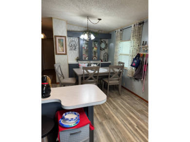 This well-maintained 2-bedroom, 2-bath home offers 1,255 sq. ft on Golden Lakes Golf Course in Florida - for sale on GolfHomes.com, golf home, golf lot