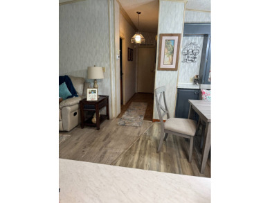 This well-maintained 2-bedroom, 2-bath home offers 1,255 sq. ft on Golden Lakes Golf Course in Florida - for sale on GolfHomes.com, golf home, golf lot