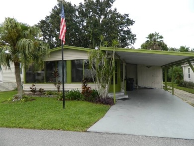 Lovely oasis in backyard, this 1,467 sq ft home on a perimeter on Grasslands Golf and Country Club in Florida - for sale on GolfHomes.com, golf home, golf lot