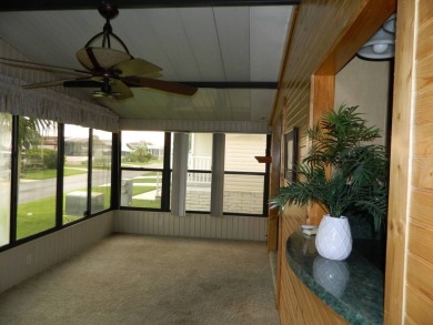 Lovely oasis in backyard, this 1,467 sq ft home on a perimeter on Grasslands Golf and Country Club in Florida - for sale on GolfHomes.com, golf home, golf lot