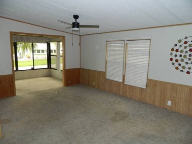 Lovely oasis in backyard, this 1,467 sq ft home on a perimeter on Grasslands Golf and Country Club in Florida - for sale on GolfHomes.com, golf home, golf lot