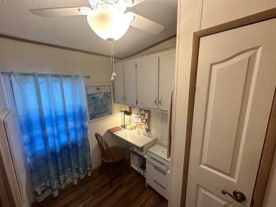A well cared for 2 bedrooms, 2 bathrooms Palm Harbor home on the on Del Tura Golf and Country Club in Florida - for sale on GolfHomes.com, golf home, golf lot