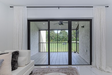 Stunning second-story condo in the prestigious Boca Lago Golf & on  in Florida - for sale on GolfHomes.com, golf home, golf lot