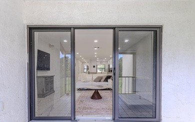 Stunning second-story condo in the prestigious Boca Lago Golf & on Boca Lago Golf and Country Club in Florida - for sale on GolfHomes.com, golf home, golf lot