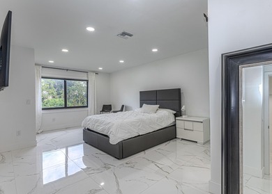 Stunning second-story condo in the prestigious Boca Lago Golf & on Boca Lago Golf and Country Club in Florida - for sale on GolfHomes.com, golf home, golf lot