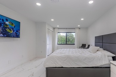 Stunning second-story condo in the prestigious Boca Lago Golf & on Boca Lago Golf and Country Club in Florida - for sale on GolfHomes.com, golf home, golf lot