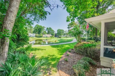 This hard-coat stucco home is positioned on a beautiful lot with on The Landings Club - Oakridge in Georgia - for sale on GolfHomes.com, golf home, golf lot