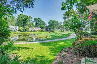 This hard-coat stucco home is positioned on a beautiful lot with on The Landings Club - Oakridge in Georgia - for sale on GolfHomes.com, golf home, golf lot