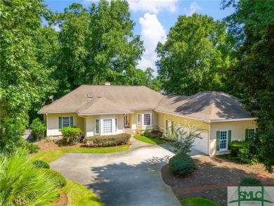 This hard-coat stucco home is positioned on a beautiful lot with on The Landings Club - Oakridge in Georgia - for sale on GolfHomes.com, golf home, golf lot