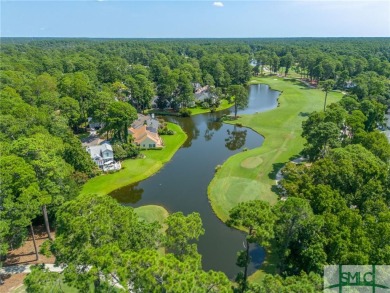 This hard-coat stucco home is positioned on a beautiful lot with on The Landings Club - Oakridge in Georgia - for sale on GolfHomes.com, golf home, golf lot