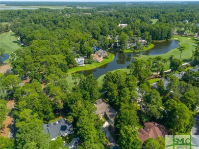 This hard-coat stucco home is positioned on a beautiful lot with on The Landings Club - Oakridge in Georgia - for sale on GolfHomes.com, golf home, golf lot