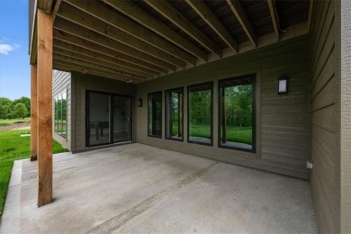 Welcome to The Richmond by Syler Construction! This thoughtfully on Shoal Creek Golf Course in Missouri - for sale on GolfHomes.com, golf home, golf lot
