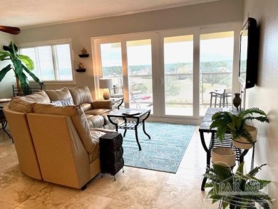 This beautifully furnished, wheelchair-accessible corner unit on on Pensacola Country Club in Florida - for sale on GolfHomes.com, golf home, golf lot