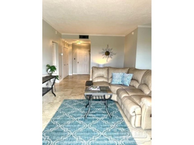 This beautifully furnished, wheelchair-accessible corner unit on on Pensacola Country Club in Florida - for sale on GolfHomes.com, golf home, golf lot
