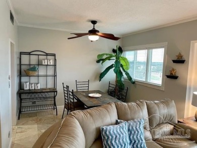 This beautifully furnished, wheelchair-accessible corner unit on on Pensacola Country Club in Florida - for sale on GolfHomes.com, golf home, golf lot