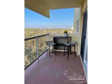 This beautifully furnished, wheelchair-accessible corner unit on on Pensacola Country Club in Florida - for sale on GolfHomes.com, golf home, golf lot