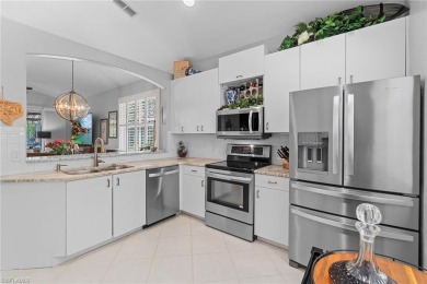 Live the indoor-outdoor lifestyle in this beautifully updated on Gateway Golf and Country Club in Florida - for sale on GolfHomes.com, golf home, golf lot