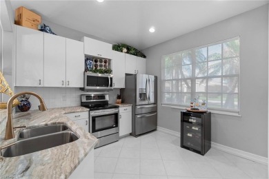 Live the indoor-outdoor lifestyle in this beautifully updated on Gateway Golf and Country Club in Florida - for sale on GolfHomes.com, golf home, golf lot